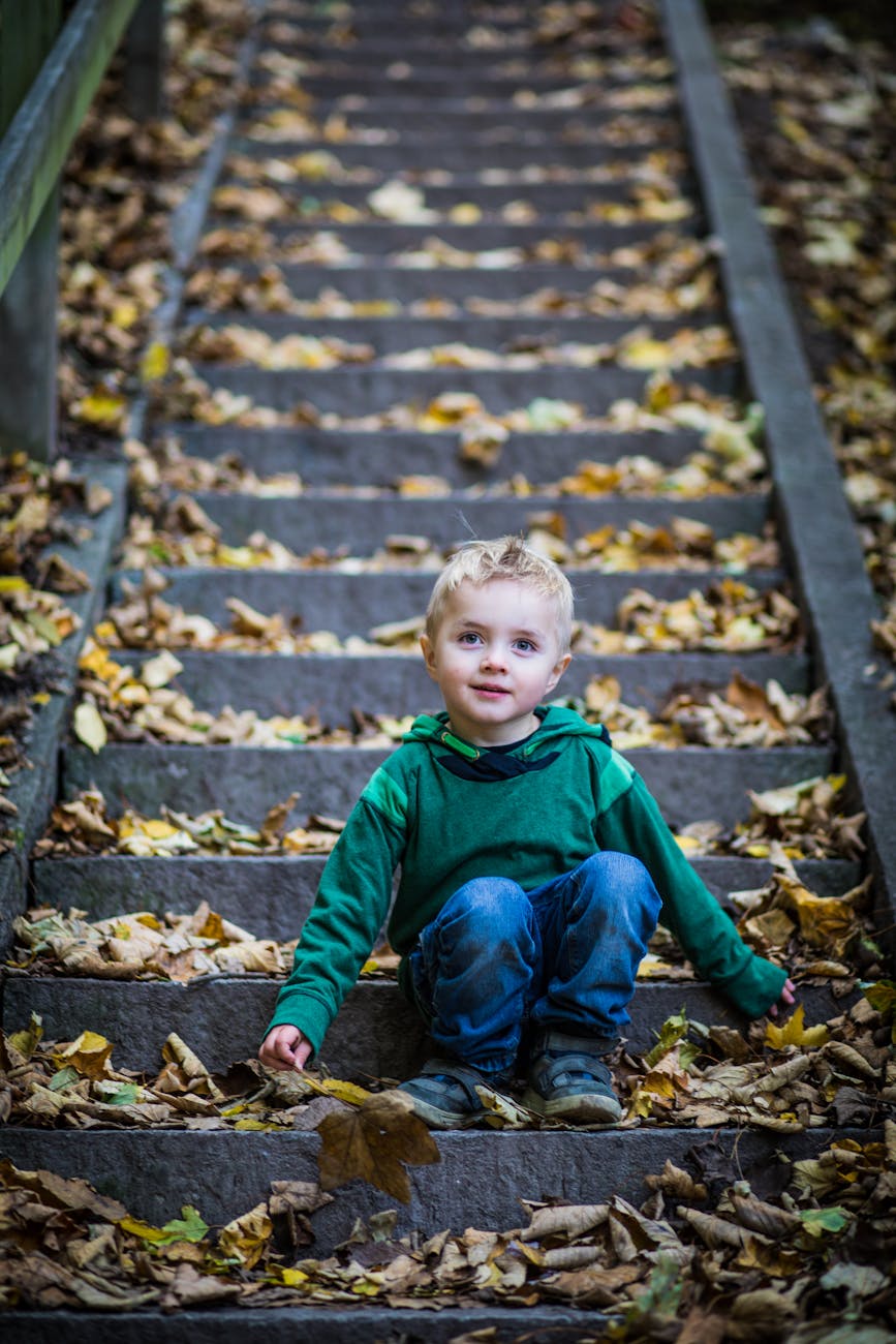 boy sitting on stairs